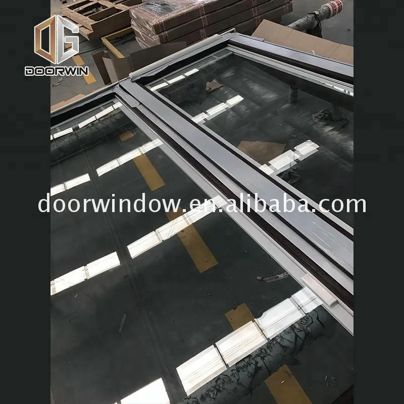 DOORWIN 2021Sliding door with tempered glazing philippines price and design remote control glass by Doorwin on Alibaba