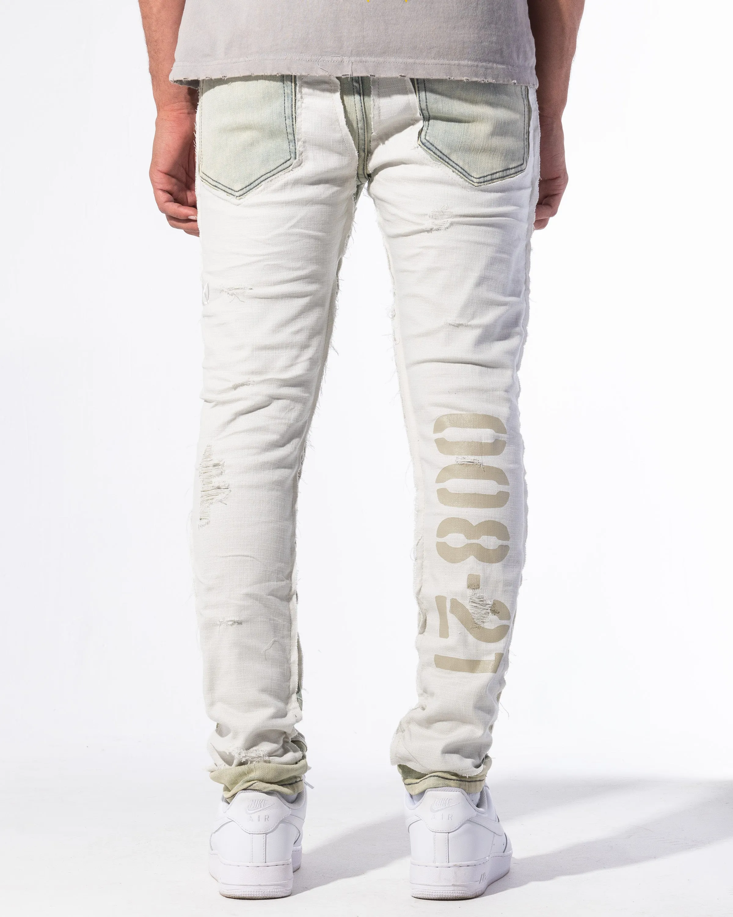 "RESISTANCE" DENIM (LIGHT WASH/CANVAS)
