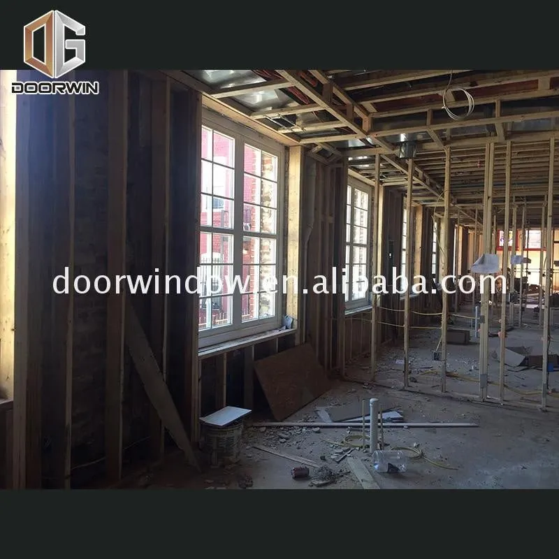 white stain pine timber wooden window with grill design by Doorwin on Alibaba